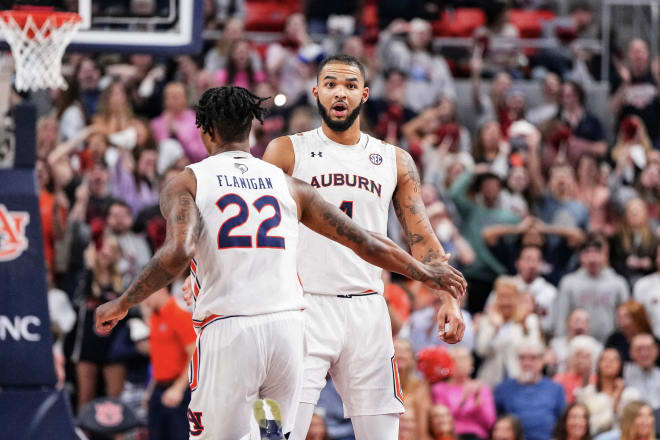 Johni Broome and Allen Flanigan celebrate