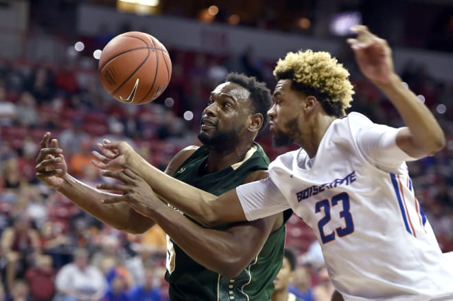 Colorado State's Tiel Daniels (15) and Boise State's James Webb III (23) vie for a rebound during the second half of an NCAA college basketball game at the Mountain West Conference men's tournament Thursday, March 10, 2016, in Las Vegas. Colorado State won 88-81. 