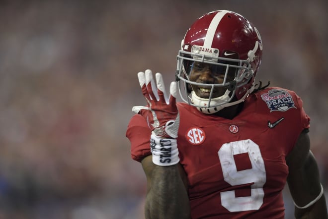 Alabama Crimson Tide running back Bo Scarbrough (9) runs the ball for a touchdown against the Washington Huskies during the fourth quarter in the 2016 CFP semifinal at the Peach Bowl at the Georgia Dome. Photo | USA Today