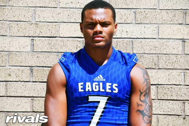 Texas wide receiver Latrell Neville maintains high interest in Michigan. 