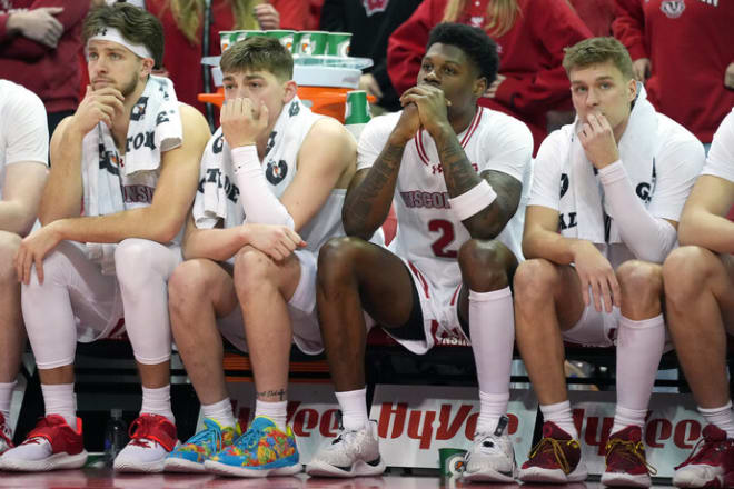 The Wisconsin Badgers bench watches the last minute of their 75-69 loss to No.2 Purdue.
