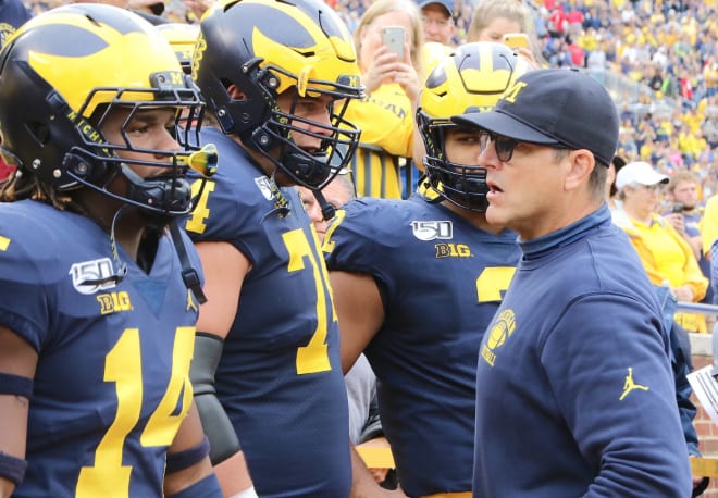 Michigan head coach Jim Harbaugh and his team are preparing as though there will be football this fall.