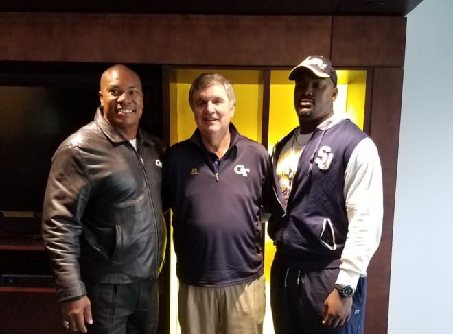 Tech assistant Joe Speed, Tech coach Paul Johnson and Jefferies pose during his visit to the Flats