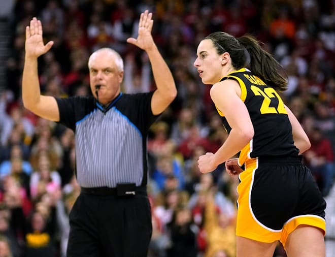 Iowa guard Caitlin Clark (22) reacts after hitting a three-point basket during the second half of their game Sunday, December 10, 2023 at the Kohl Center in Madison, Wisconsin. Iowa beat Wisconsin 87-65.