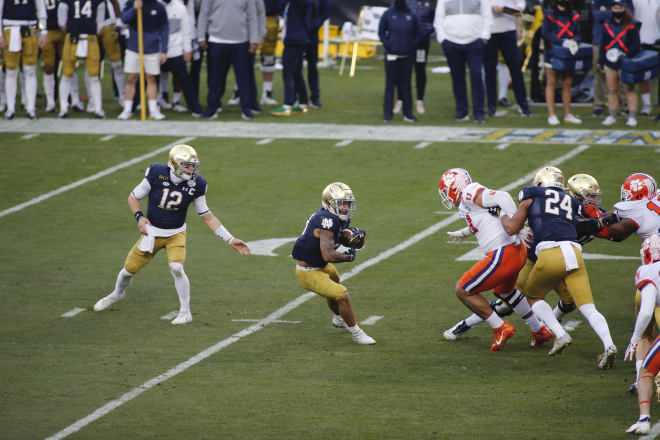 Notre Dame Fighting Irish football quarterback Ian Book and running back Kyren Williams versus Clemson in the ACC Championship