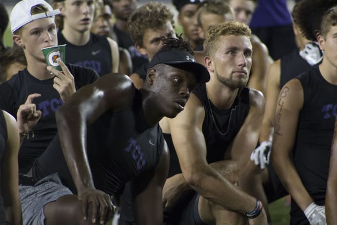 Geor'Quarius Spivey and Slade Bolden listening to Gary Patterson at the conclusion of the camp at TCU on July 21 2017.