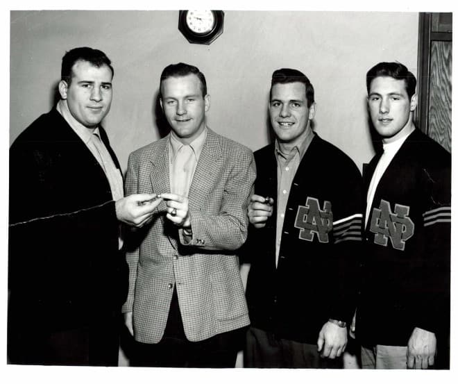 Guglielmi (far right) with, from left to right, Frank Varrichione, head coach Terry Brennan and Dan Shannon.