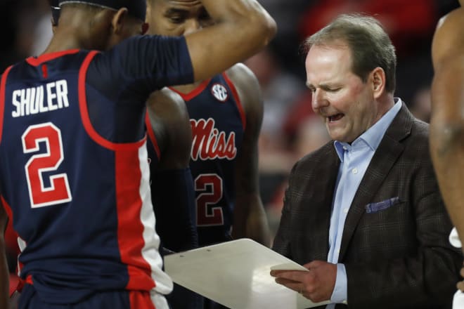 Ole Miss coach Kermit Davis talks to his team during a timeout Saturday in Athens, Ga. Ole Miss defeated Georgia, 80-64.