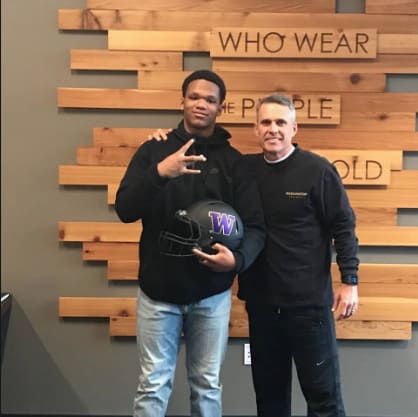 Sav'ell Smalls (left) with UW coach Chris Petersen (right) during an unofficial visit