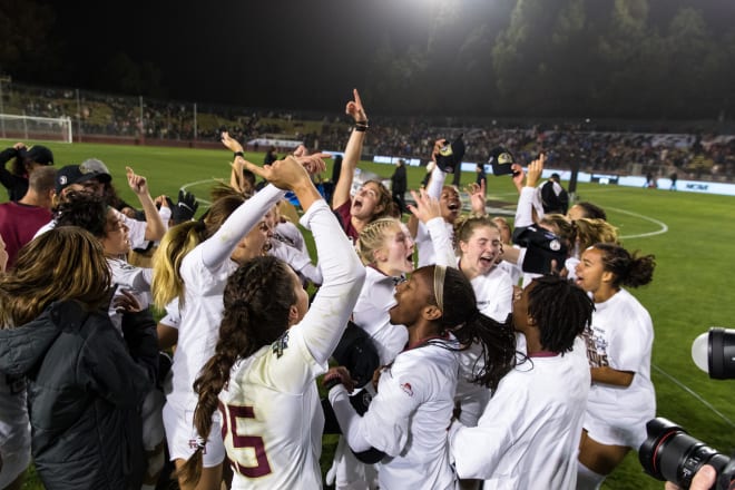 Florida State's players celebrate their national championship victory Monday night against BYU.