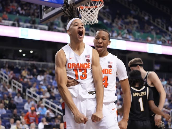 Mar 8, 2023; Greensboro, NC, USA; Syracuse Orange forward Benny Williams (13) and guard Quadir Copeland (24) react in the second half of the second round at Greensboro Coliseum. Mandatory Credit: Bob Donnan-USA TODAY Sports