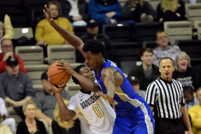 Vandy's Saben Lee is closely guarded by MTSU's Brandon Walters.