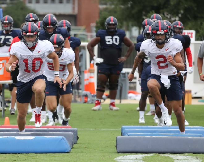 Ole Miss quarterbacks Matt Corral (right) and John Rhys Plumlee. 