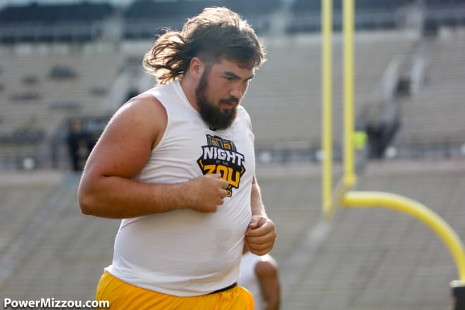 Missouri offensive lineman Case Cook no longer has his mullet to market, but he said Thursday he has agreed to several NIL endorsements.