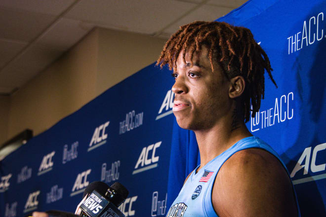 Armando Bacot met with the media in the breakout area following their 81-53 loss to Syracuse. (Jacob Turner THI)