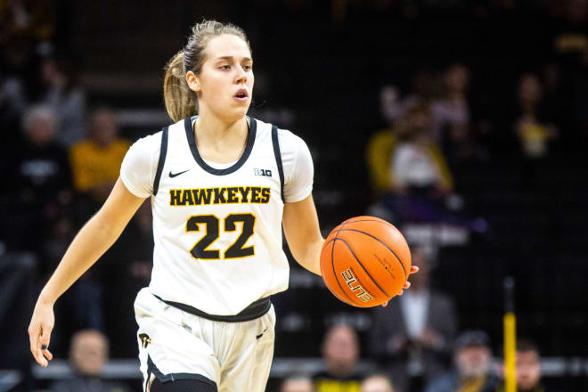 Kathleen Doyle brings the ball up for Iowa. 