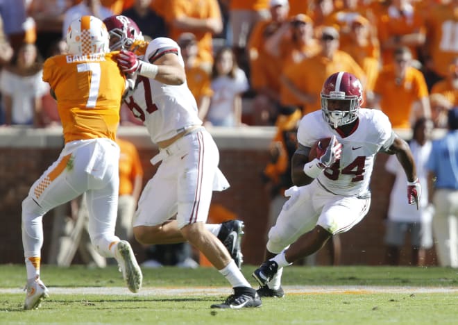 Alabama running back Damien Harris (34) follows a block by Alabama tight end Miller Forristall (87) Saturday, October 15, 2016 at Neyland Stadium in Knoxville, Tennessee. Staff Photo/Gary Cosby Jr.  Alabama vs Tennessee Gary Cosby Jr./Tuscaloosa News