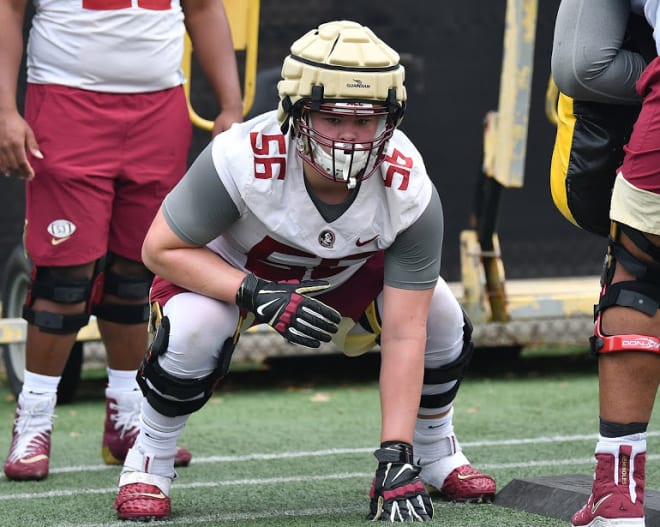 Freshman offensive lineman Zane Herring gets ready for a drill earlier this spring during FSU football practice.