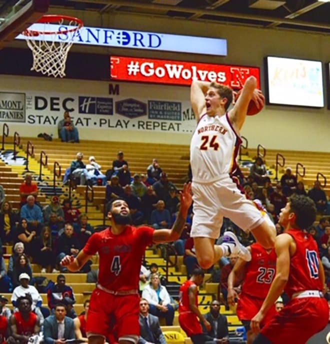 Future Gopher Parker Fox skies for the slam while at Northern State