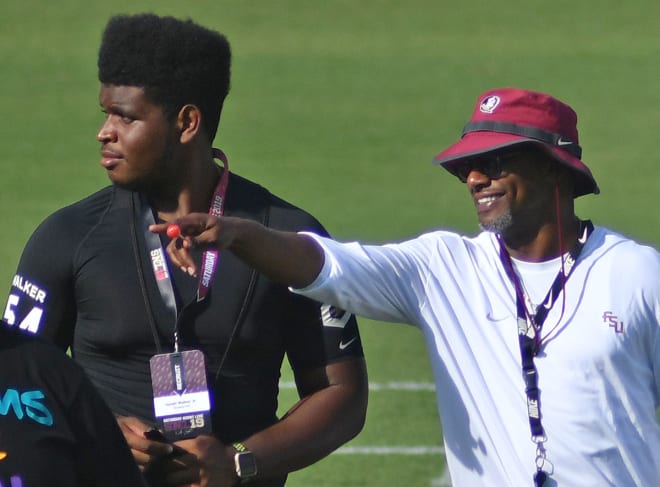 Four-star OT Issiah Walker spends time with FSU coach Willie Taggart at Saturday Night Live.
