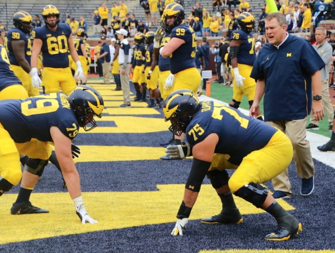 Michigan Wolverines football offensive line coach Ed Warinner coached at Ohio State from 2012-16.