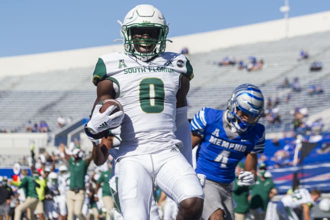 Nov 7, 2020; Memphis, Tennessee; South Florida Bulls defensive back Daquan Evans (0) celebrates after scoring a touchdown after intercepting a pass against the Memphis Tigers at Liberty Bowl Memorial Stadium. 