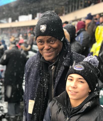 Steele taking in the 2017 Army-Navy game with his grandson, Nicholas 