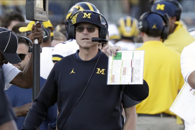 Michigan Wolverines head football coach Jim Harbaugh has won 49 games at U-M.