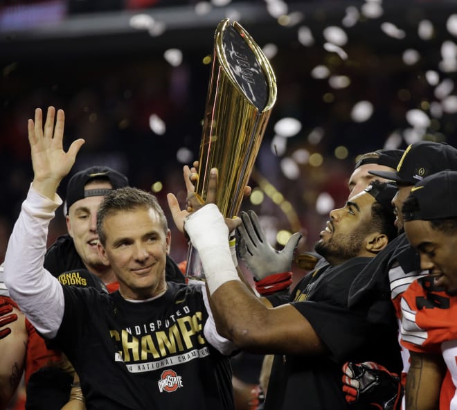 Urban Meyer and Ezekiel Elliott led the Buckeyes to a win in the first-ever CFP National Championship Game to end the 2014 season.