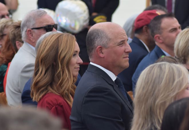 Clay Helton and his wife Angela look on during the ceremony.