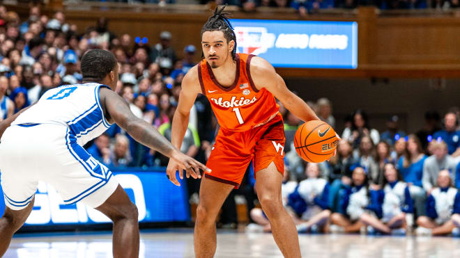 Rodney Rice (No. 1) dribbles the ball versus Duke. 