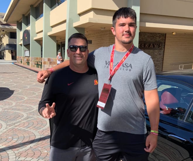 Top-ranked 2026 OL prospect Jackson Cantwell with USC OL coach Henson on his Saturday visit.