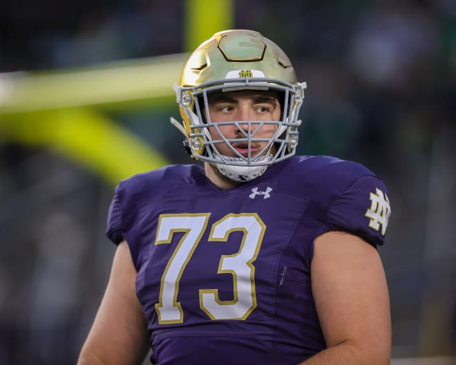 With bachelor's and master's degrees in hand, Notre Dame offensive lineman Andrew Kristofic (73) is ready to turn the page on his football career. 