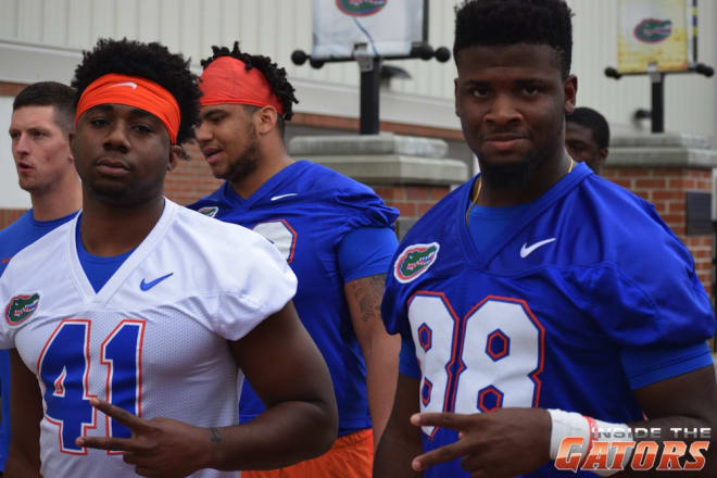 Linebacker James Houston (41) and tight end Kemore Gamble (88), two Florida early enrollees