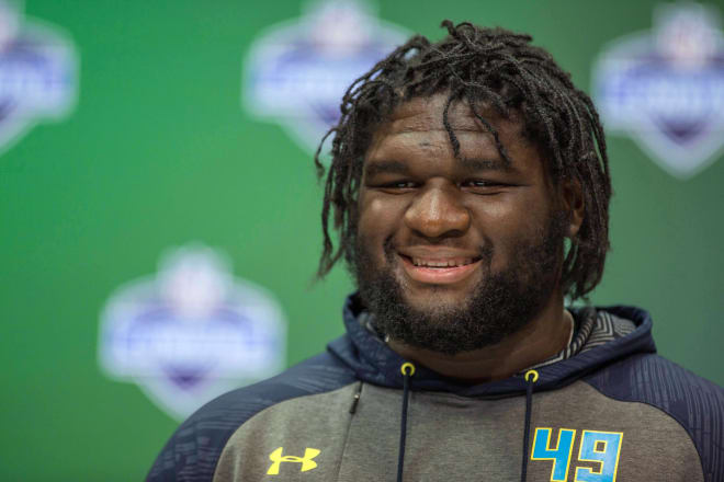 Alabama defensive tackle Dalvin Tomlinson speaks to the media during the 2017 combine at Indiana Convention Center. Mandatory Credit: Trevor Ruszkowski-USA TODAY Sports.