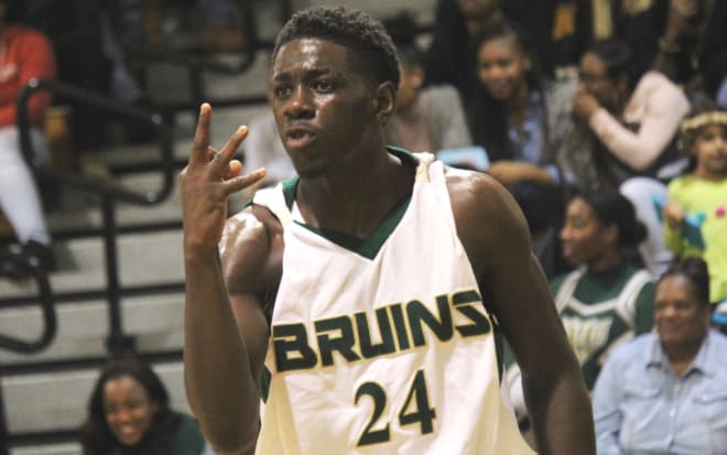 Fresh off the football field, Jeremiah Owusu brings the Bruins toughness, rebounding and hustle