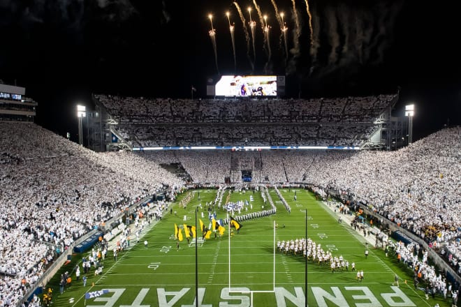 Penn State and Iowa take the field at the same time to play in a White Out football game at Beaver Stadium on Saturday, Sept. 23, 2023.