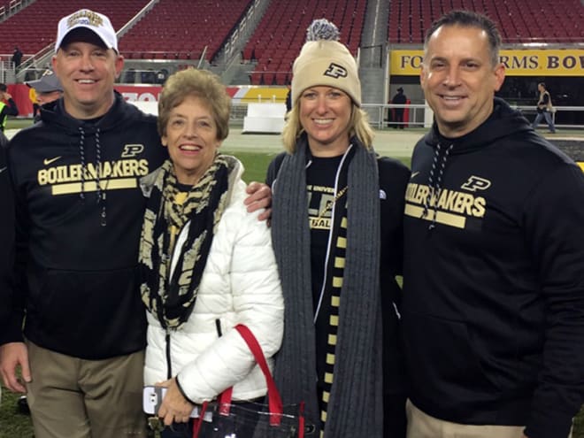 Donna Brohm (white jacket) with Jeff, Kim and Greg after Purdue's bowl victory in San Francisco in December.