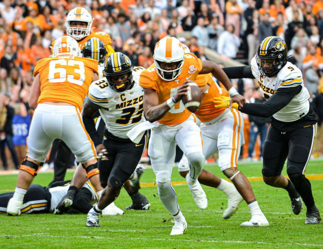 Tennessee quarterback Hendon Hooker (5) sprints for a first down on Senior Day in Neyland Stadium in Knoxville. 