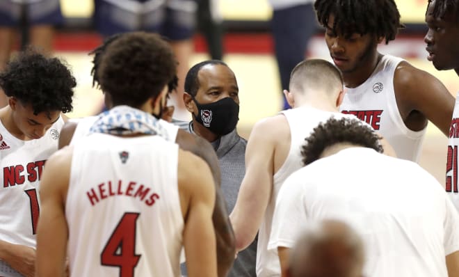 NC State Wolfpack basketball coach Kevin Keatts and guard Devon Daniels