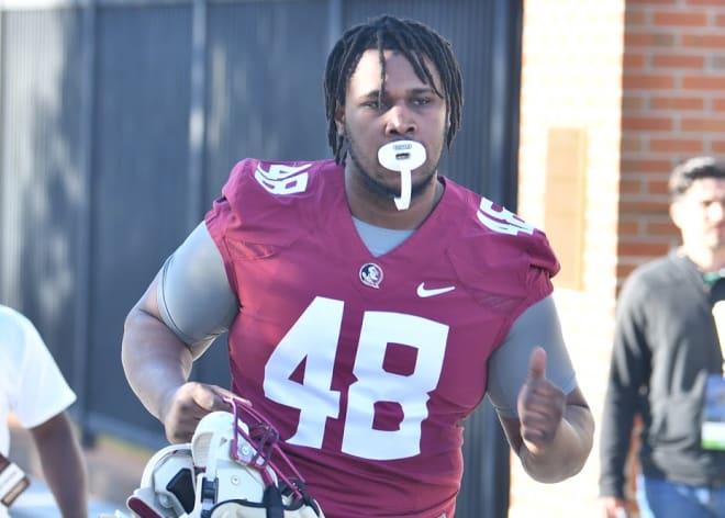 Defensive lineman Jarrett Jackson jogs onto the FSU practice fields this spring.