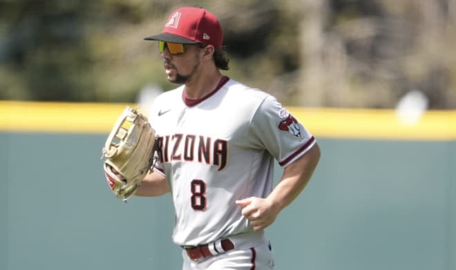 Former Arkansas outfielder Dominic Fletcher made his MLB debut Sunday against the Colorado Rockies.