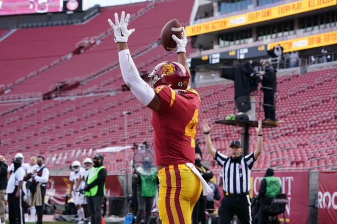 Bru McCoy celebrates a key touchdown in USC's fourth-quarter rally Saturday.