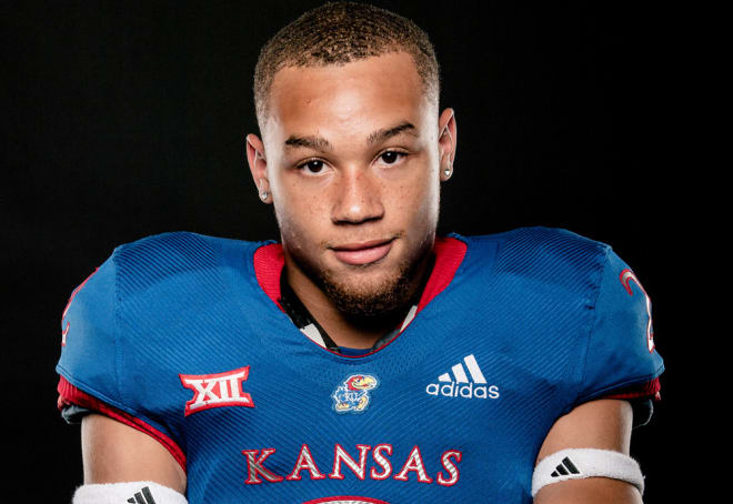 Arnold stays in constant contact with Emmett Jones and KU coaches