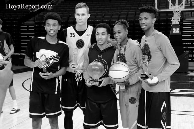 Tremont Waters (center), holding NBPA Top 100 hardware, is now a Hoya! 