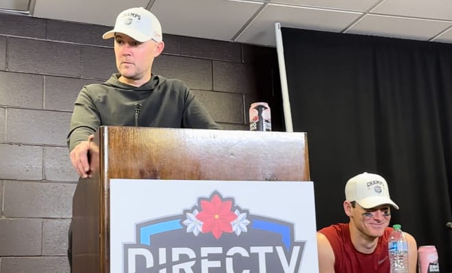 QB Miller Moss, right, laughs as head coach Lincoln Riley is asked if Moss locked up the starting job for 2024.