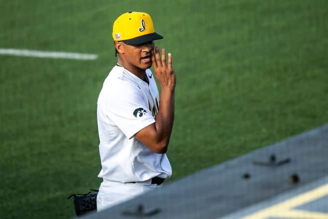 Iowa pitcher Marcus Morgan talks to the Iowa dugout during Iowa's game against Michigan State. 