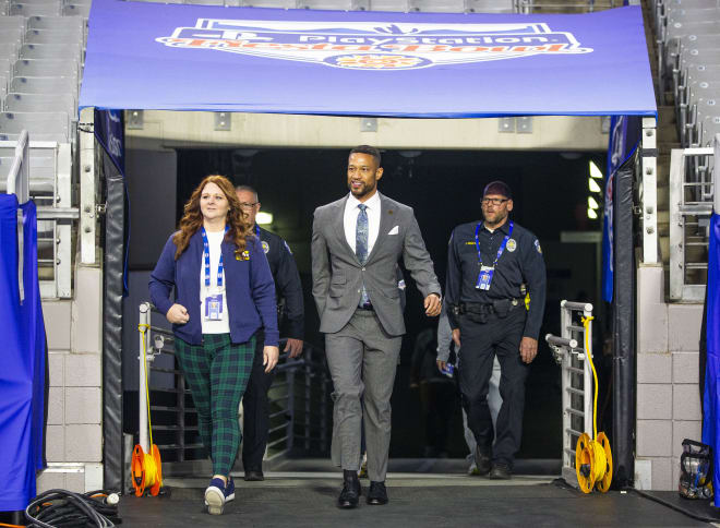 ND coach Marcus Freeman walks onto the field before the Fiesta Bowl on Saturday, Jan. 1, 2022, at State Farm Stadium in Glendale, Ariz.