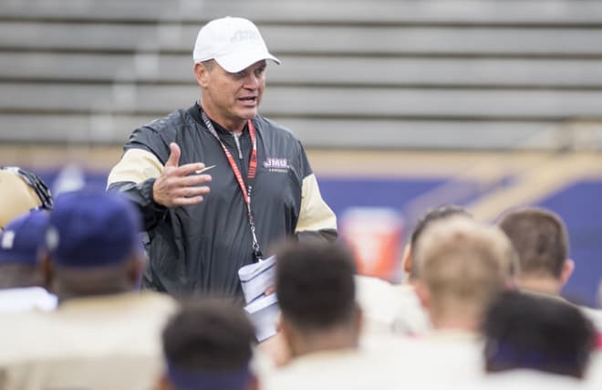 James Madison coach Mike Houston (shown earlier this season after a practice) said there will be changes to the recruiting cycle.