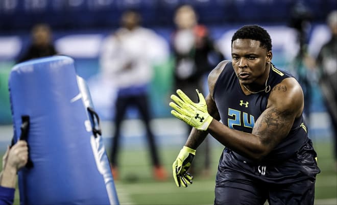 Jarron Jones participates in a drill at the NFL Combine on Sunday in Indianapolis.